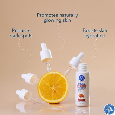 A clean, minimalist product spotlight showing a Vitamin C face serum bottle with floating droppers and a sliced orange to highlight key skin benefits.